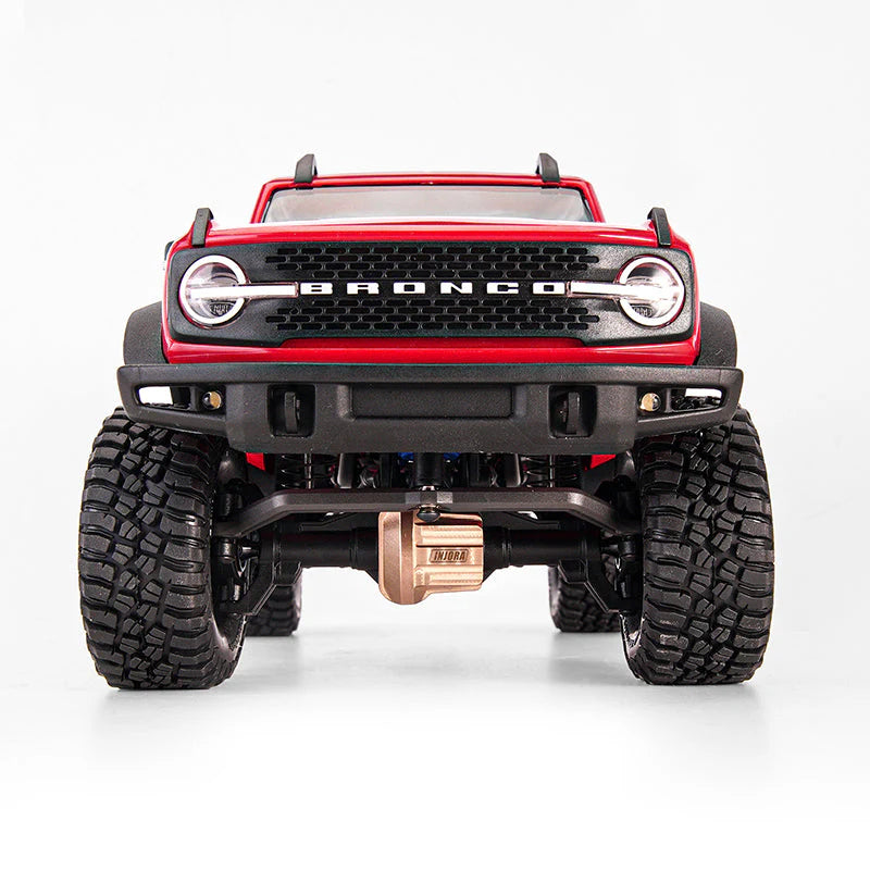 Red toy truck with 'Bronco' branding on a white background