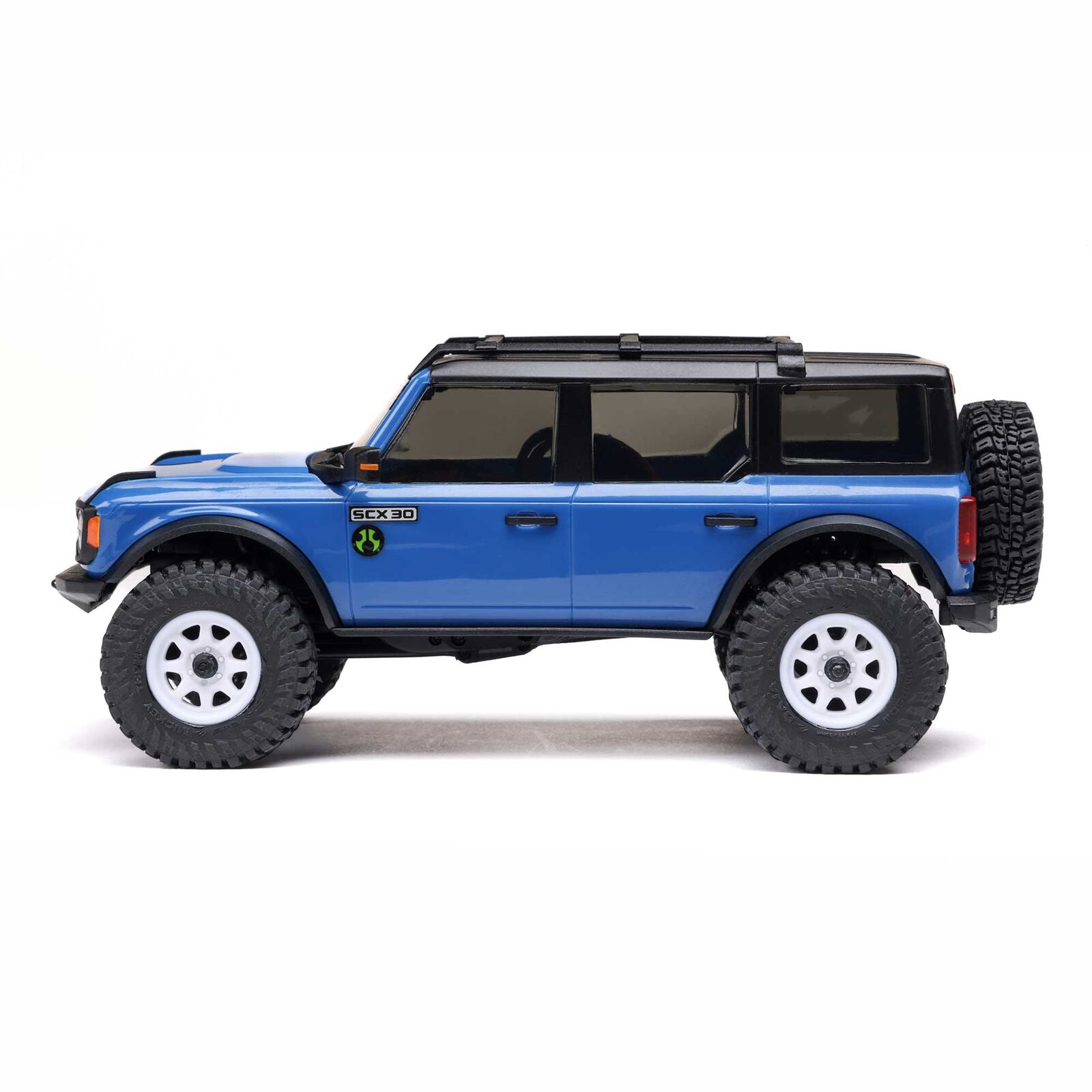 Blue off-road vehicle model on a white background