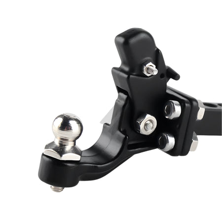 Close-up of a black metal trailer hitch with silver ball on a white background