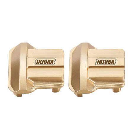 Two gold metal components with INJORA branding on a white background