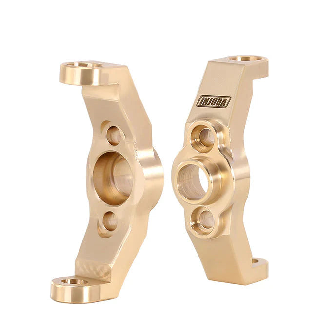 Two gold metal components with INJORA branding on a white background