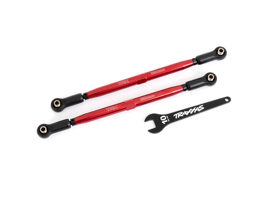 Two red aluminum toe links with black ends and a black aluminum wrench, labeled with '7075-T6' and 'TRAXXAS' branding.