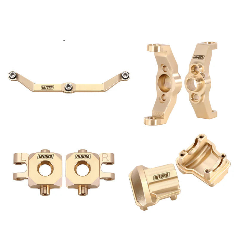 Gold metal components with INJORA branding on a white background