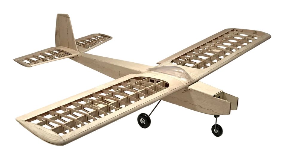 Wooden model airplane on a reflective surface with a neutral background