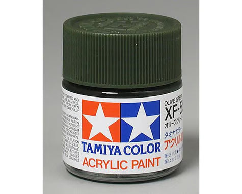 Tamiya Color acrylic paint jar with green lid on a gray background